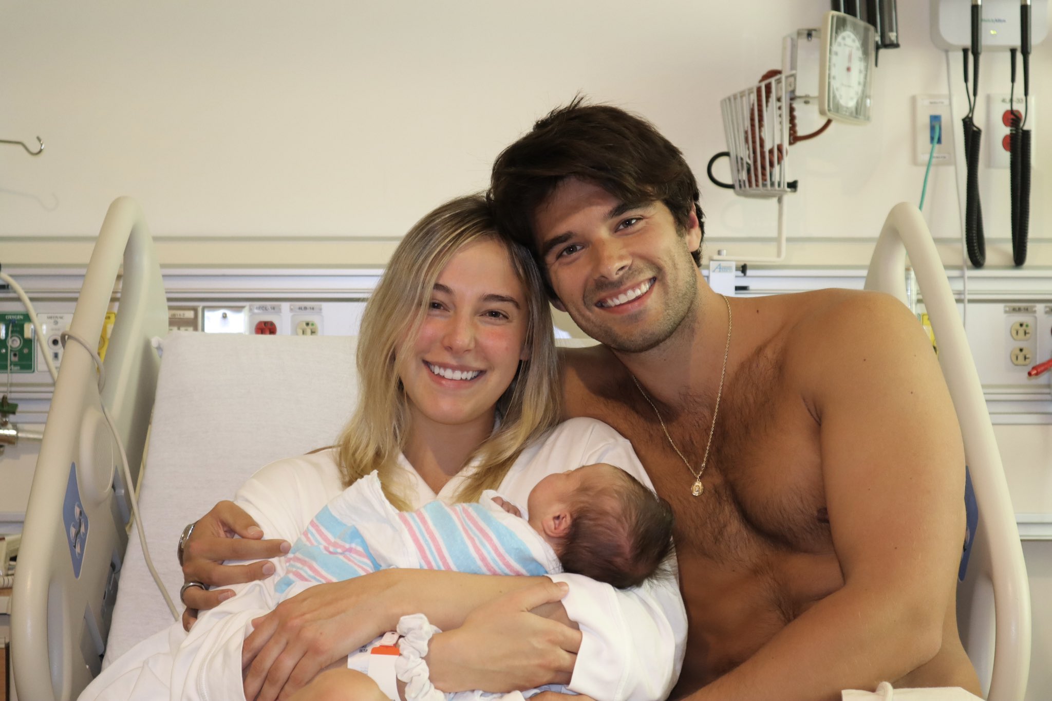 Josh Swickard and Lauren with their first baby