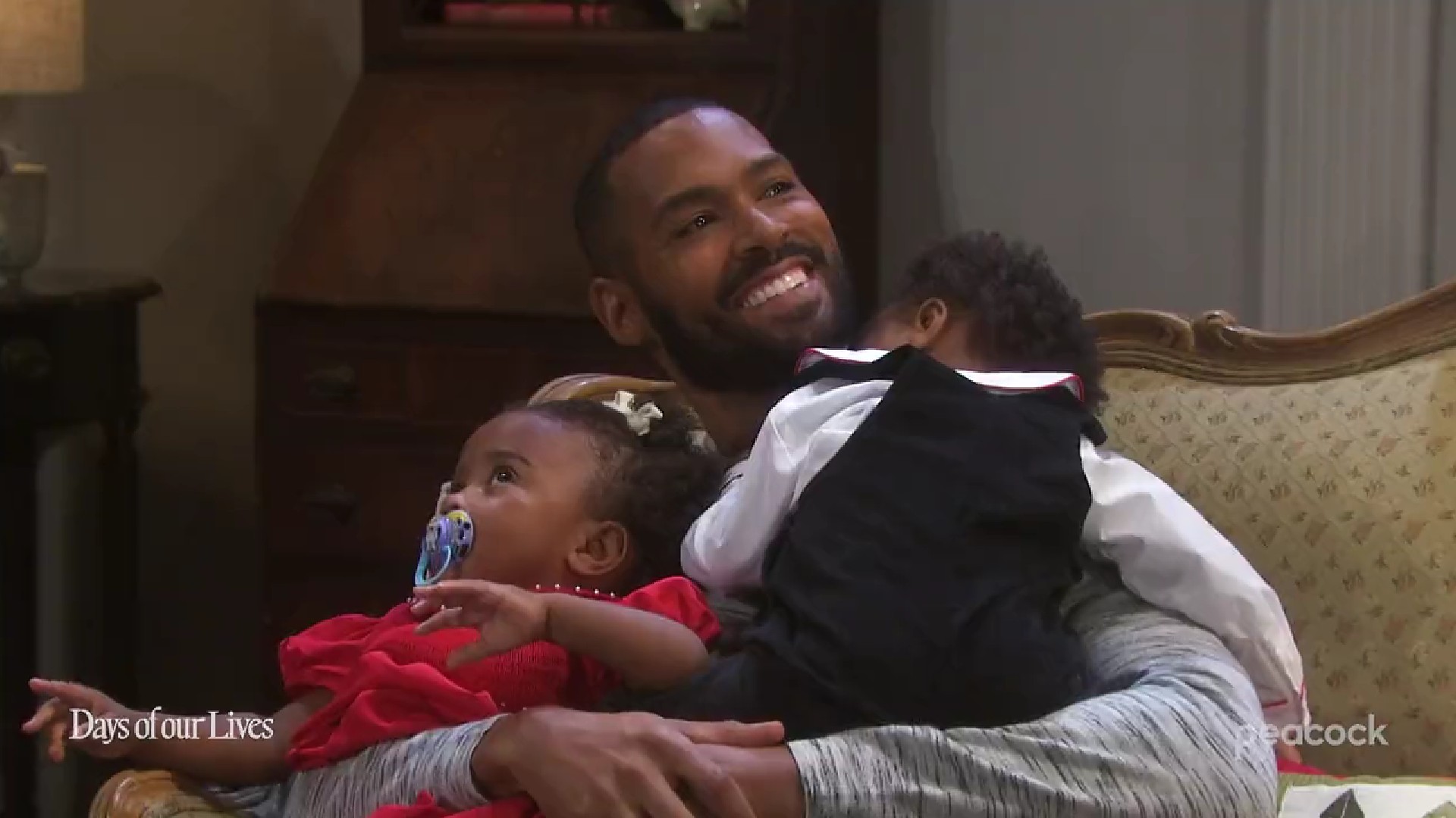 DOOL/Eli (Lamon Archey) returns with his twins to town